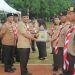 Anggota DPRD Luwu Timur, Sarkawi A Hamid saat menghadiri apel akbar dalam rangka HUT ke-64 Pramuka, di Lapangan Pendidikan Malili, Selasa 19 Agustus 2025.