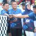 Bupati Luwu Timur Irwan Bachri Syam melepas 3.000 peserta Fun Run Juara 2026 di Bundaran Batara Guru, Malili, Minggu (21/6), dalam rangka HUT ke-23 Kabupaten Luwu Timur. Foto: Kominfo-SP
