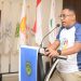 Ketua KONI Luwu Timur, Herawan Raditya menyampaikan sambutan pada rapat kerja KONI Lutim di Aula Wisma Trans, Malili, Sabtu (18/07/2026). Foto: Chullank_Art