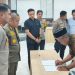 Penandatanganan komitmen perdamaian dua kelompok pemuda Wotu di Aula Mapolres Luwu Timur, Kamis (29/10/2026). Foto: Jaeja.id